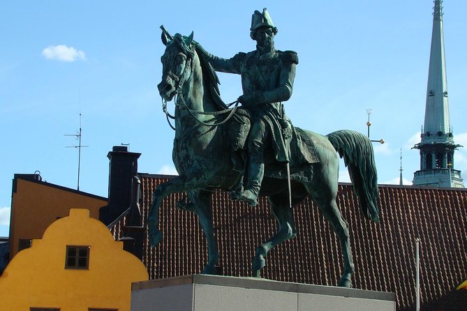 The Story of Stockholm and Sweden in Three Chapters, a Small Group Walking Tour - Stop 8: Stortorget, Nobel connections, and guard change timing
